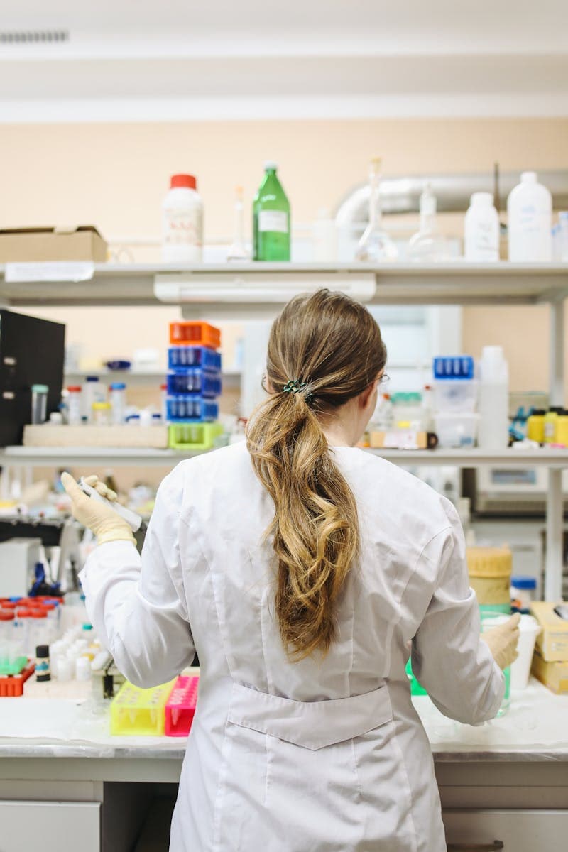 Chemist formulating custom skincare products